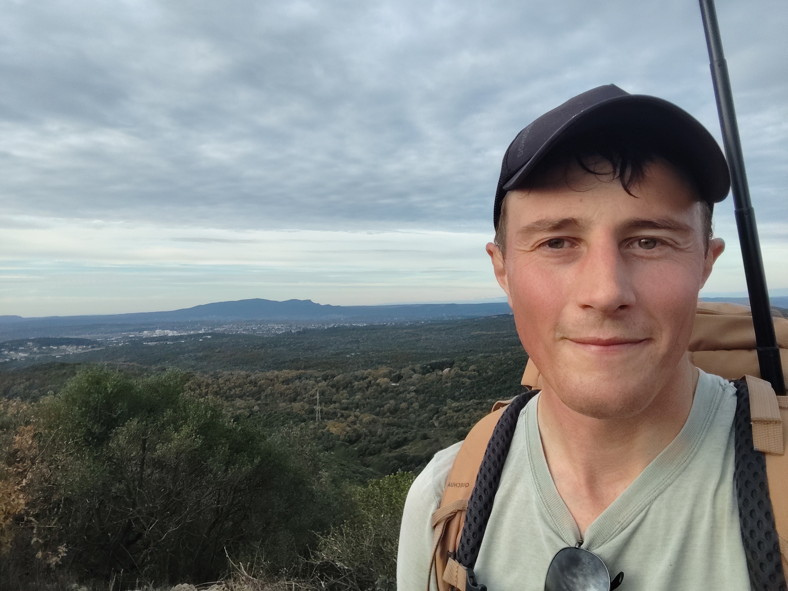 Zach taking panoramic photos on a hiking trail in the Gard region, France